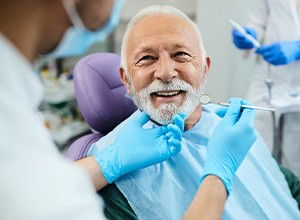 Dentist about to examine a patient’s mouth