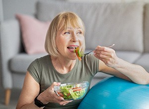 Woman eating a salad