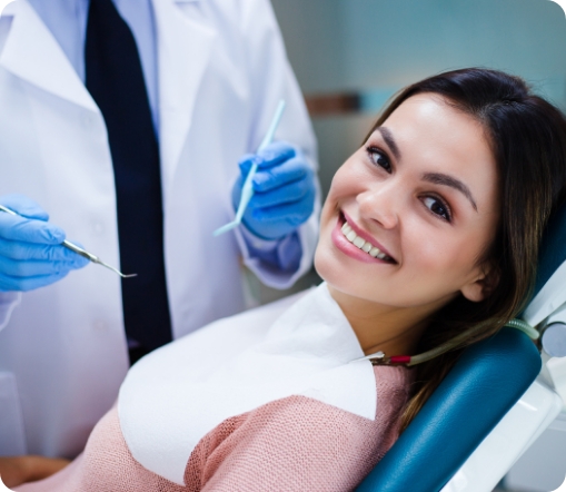 Female dental patient looking at dentist