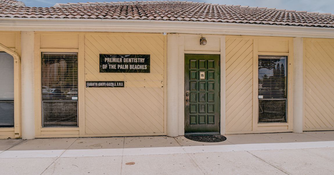 Outside shot of Premier Dentistry of the Palm Beaches dental office building